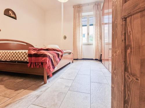 Ένα ή περισσότερα κρεβάτια σε δωμάτιο στο Casa La Torre Rio Marina