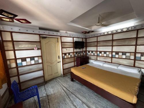 Ένα ή περισσότερα κρεβάτια σε δωμάτιο στο MJ guest house