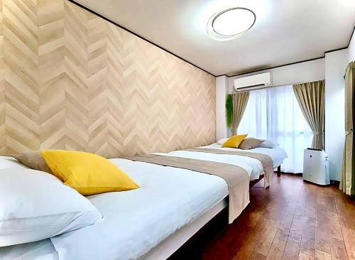 4 Beds & Great for Long Stays , Kyocera Dome Nearby , USJ & Namba 15min , Direct to KIX , Guest House 大正