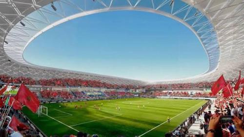 a soccer stadium filled with people watching a soccer game at Pearl Rabat Stay 75 TV POOL in Rabat