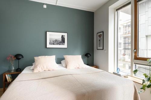 Postel nebo postele na pokoji v ubytování Premium city-center apartment in Oslo with a stunning balcony