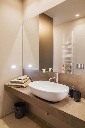 a bathroom with a large white bowl sink on a counter at Villa Vecchioni in Civitanova Alta