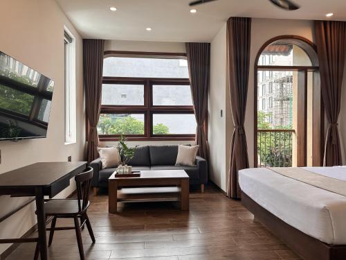 Ένα ή περισσότερα κρεβάτια σε δωμάτιο στο Picnic Day Danang