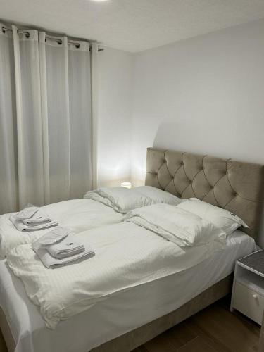 Postel nebo postele na pokoji v ubytování 108 Lux Apartman