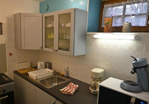 Köök või kööginurk majutusasutuses Gîte Peigne De Vénus