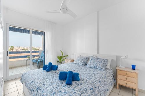 Voodi või voodid majutusasutuse Apartment In Playa Flamenca toas