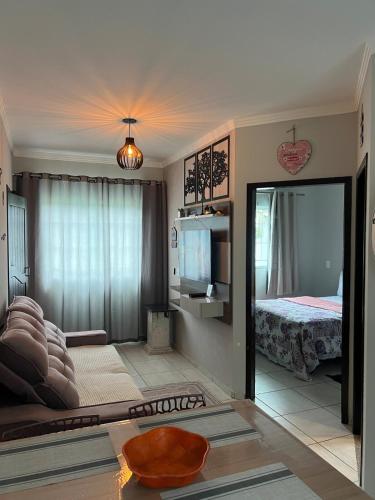 Ένα ή περισσότερα κρεβάτια σε δωμάτιο στο IR 02 · Próximo ao hospital Hans Dieter / Térreo