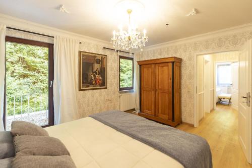 Ένα ή περισσότερα κρεβάτια σε δωμάτιο στο Schlössle Seeburg