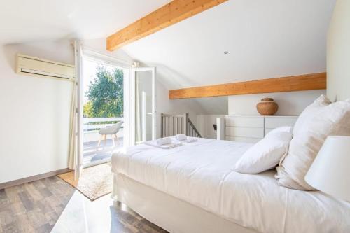 Postel nebo postele na pokoji v ubytování Villa Claire à Andernos - sea view with heated poo