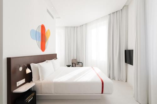 Postel nebo postele na pokoji v ubytování Ruby Giulia Hotel Rome