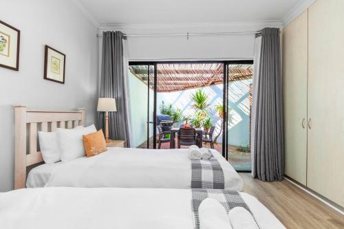 Ένα ή περισσότερα κρεβάτια σε δωμάτιο στο 19 Ascension by Host Agents