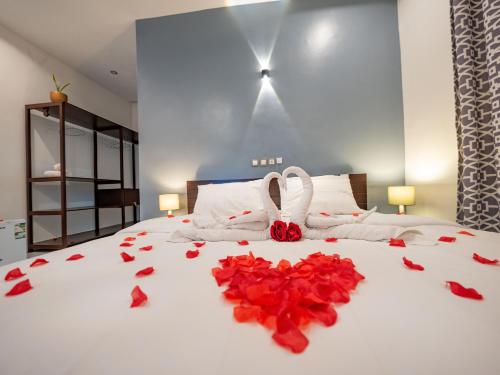 Llit o llits en una habitació de Natu Resort