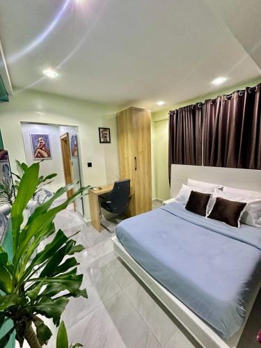 Giường trong phòng chung tại Livele maitama