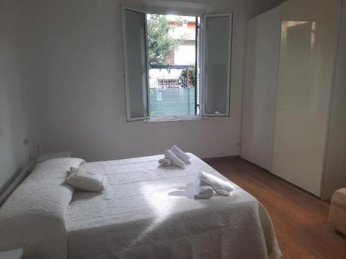 Ένα ή περισσότερα κρεβάτια σε δωμάτιο στο Arvasia City