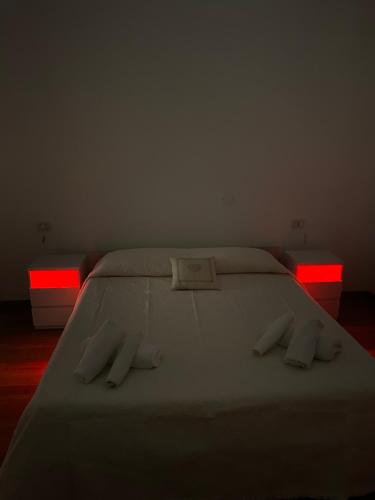 Postel nebo postele na pokoji v ubytování Arvasia City