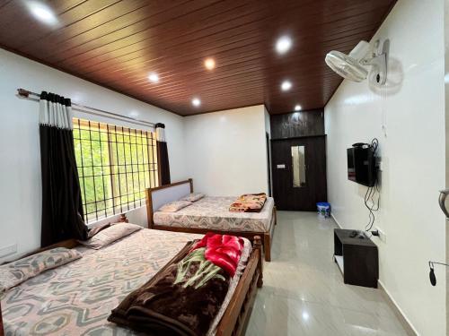 TV a/nebo společenská místnost v ubytování new hambala home stay