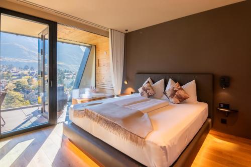 Ένα ή περισσότερα κρεβάτια σε δωμάτιο στο Levita Living Freiheit