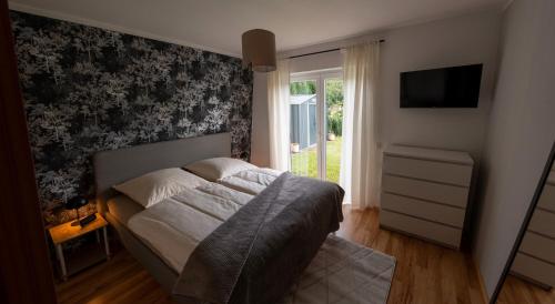 Postel nebo postele na pokoji v ubytování Rückzugsort im Sauerland