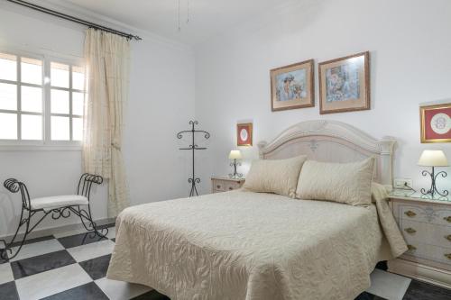 Apartamento Elvira房間的床