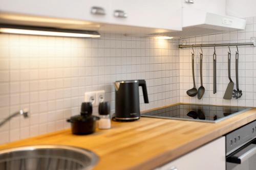 Kuchyň nebo kuchyňský kout v ubytování Ferienwohnung vino9