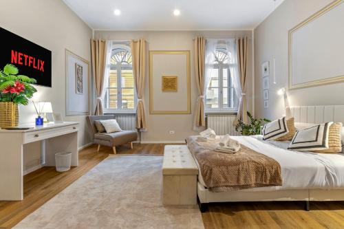 Ένα ή περισσότερα κρεβάτια σε δωμάτιο στο NEW! Da Tiffany - 115mq apartment with Wi-Fi, Disney, Netflix - 8 people