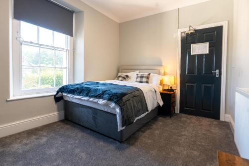 Ένα ή περισσότερα κρεβάτια σε δωμάτιο στο The Great Western