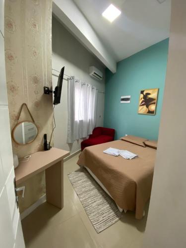 Postel nebo postele na pokoji v ubytování Apartamento Gaya - Perto da Praia e Confortável