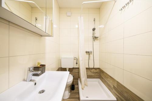 Koupelna v ubytování Apartments Children's paradise