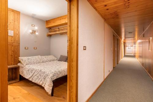 Voodi või voodid majutusasutuse Casa Andrea vista Monte Bianco toas