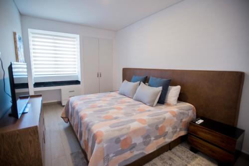 Postel nebo postele na pokoji v ubytování Real View Towers W208