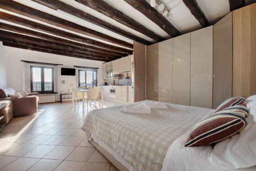 Ένα ή περισσότερα κρεβάτια σε δωμάτιο στο Casa vacanza Civetta