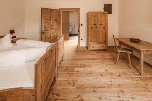 Ein Bett oder Betten in einem Zimmer der Unterkunft Josephus - Domicilium III