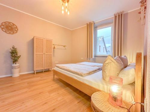 Voodi või voodid majutusasutuse Eifelleben Hillesheim toas