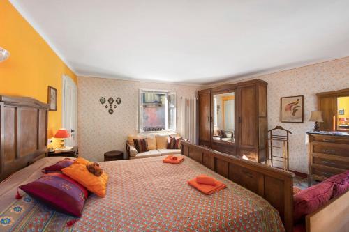 Ένα ή περισσότερα κρεβάτια σε δωμάτιο στο Il Mulino di Marina - Lake Como