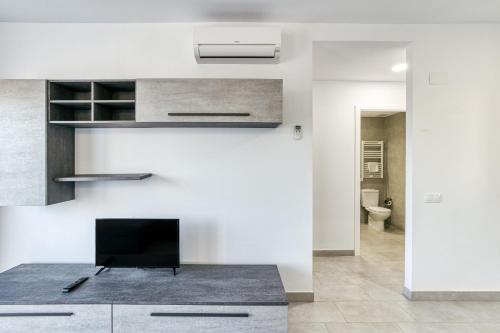 TV a/nebo společenská místnost v ubytování Giuliano Superior 2 para 4 personas