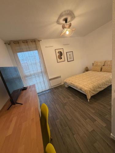 Ένα ή περισσότερα κρεβάτια σε δωμάτιο στο Cocon lumineux