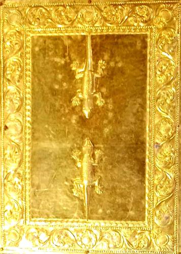 a gold frame with a statue of a woman at Temple View Guest House NEAR Kamatchi Amman Temple Non AC Fully Ventilated and No Car Parking in Kanchipuram