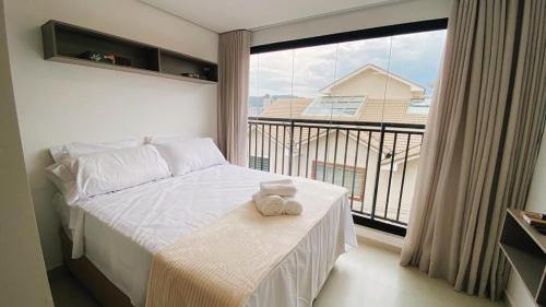 Postel nebo postele na pokoji v ubytování Stay22 | Flat novissímo em frente ao Hospital