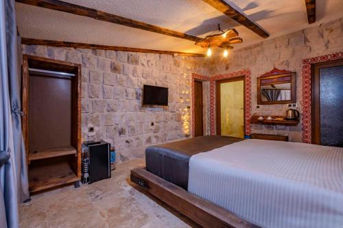 Postel nebo postele na pokoji v ubytování Tuna Guest House