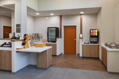 a lobby of a hospital with a counter and a door at Fairfield Inn Sacramento Cal Expo in Sacramento