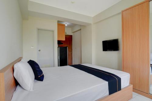 Gallery image of OYO 94837 Apartment Ekki Tower in Tjikuda Dua