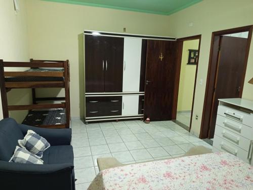 Ένα ή περισσότερα κρεβάτια σε δωμάτιο στο Recanto Rio do Peixe - Lindóia-sp