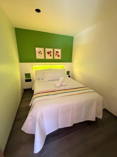 Ένα ή περισσότερα κρεβάτια σε δωμάτιο στο Habitación en Coyoacán 1