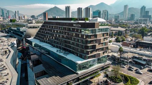 a view of a tall building in a city at The Westin Monterrey Valle in Monterrey