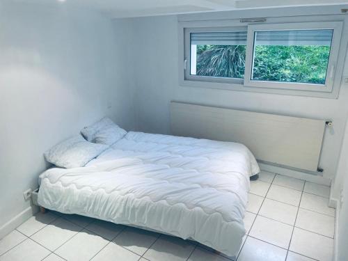 Ένα ή περισσότερα κρεβάτια σε δωμάτιο στο MB Hote