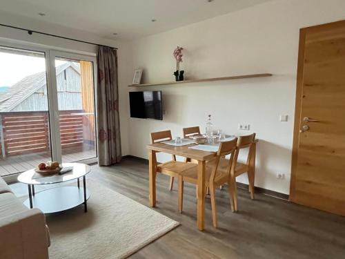 Μια τηλεόραση ή/και κέντρο ψυχαγωγίας στο Appartementhaus Longa Stubn