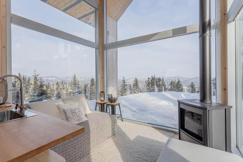 Giường trong phòng chung tại Montagne le Maelström