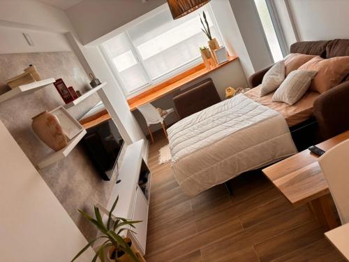 an overhead view of a living room with a couch at Pirca NQN in Neuquén