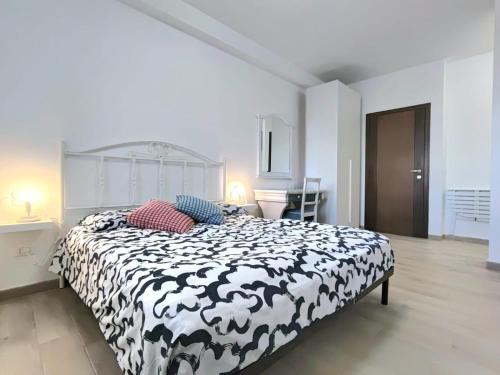 Postel nebo postele na pokoji v ubytování Le Coccinelle