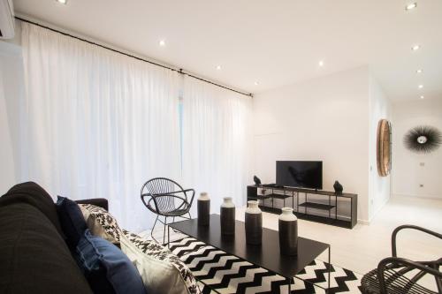 TV o dispositivi per l'intrattenimento presso Valencia Luxury - Boutique Center